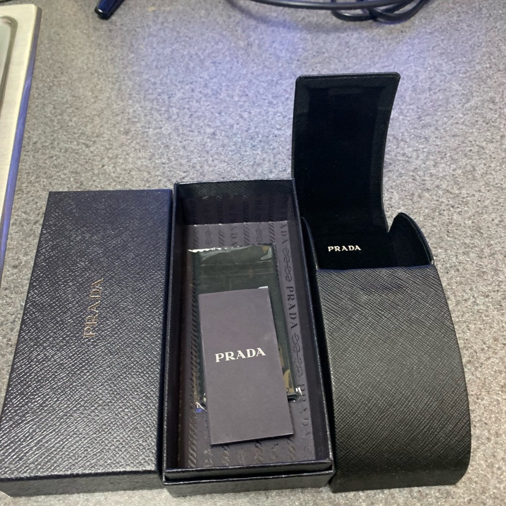 COPY - New and original Prada sunglasses case with box, cloth, and tags.